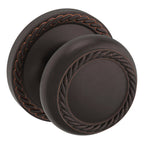 Baldwin Hardware Perilla 5064 con Roseta 5004 — Bronce veneciano — Paso
