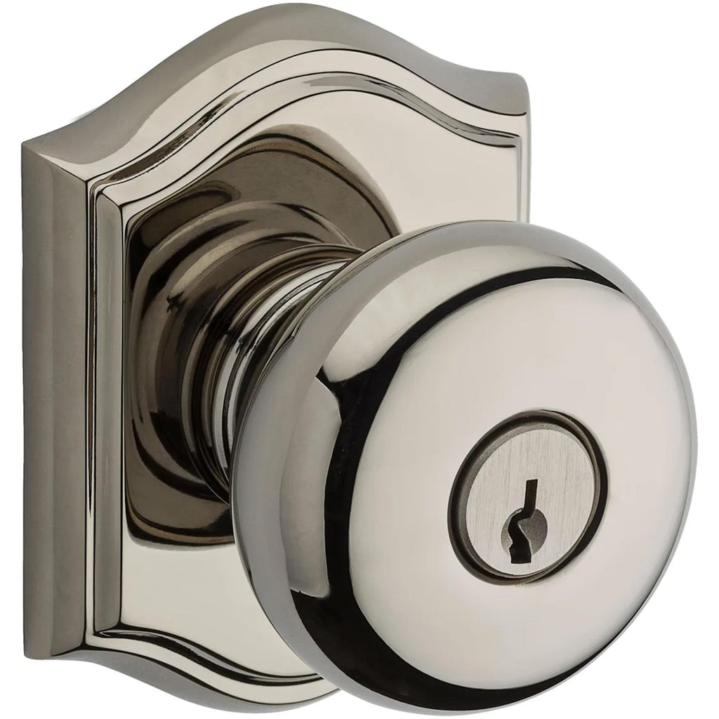 Baldwin Hardware Reserve Perilla con Llave Round — Níquel pulido Lifetime — Traditional Arch
