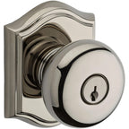 Baldwin Hardware Reserve Perilla con Llave Round — Níquel pulido Lifetime — Traditional Arch