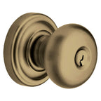 Baldwin Hardware Juego de Entrada con Llave 5205 — Perilla Classic con Roseta Clásica — Latón antiguo
