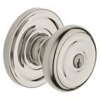Baldwin Hardware Juego de Entrada con Llave 5210 — Perilla Colonial con Roseta Clásica — Níquel pulido Lifetime