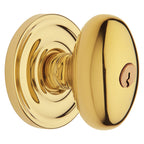 Baldwin Hardware Juego de Entrada con Llave 5225 — Perilla Egg con Roseta Clásica — Latón sin laca