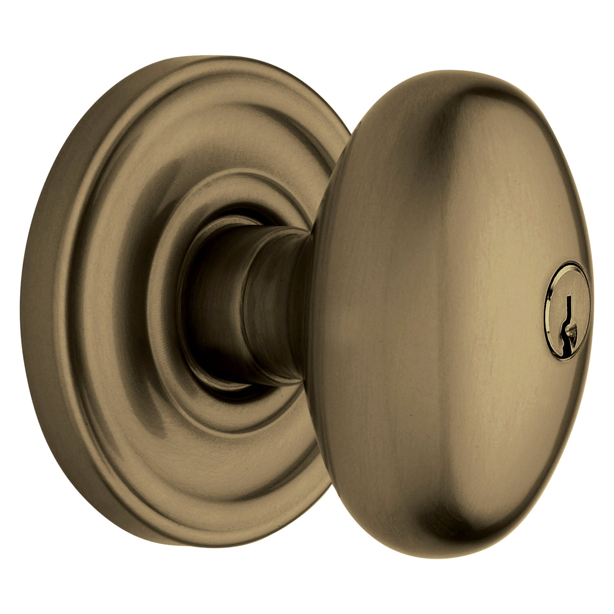 Baldwin Hardware Juego de Entrada con Llave 5225 — Perilla Egg con Roseta Clásica — Latón antiguo