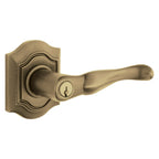 Baldwin Hardware Juego de Entrada con Llave 5237 — Manija Bethpage con Roseta Bethpage — Latón antiguo