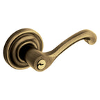 Baldwin Hardware Juego de Entrada con Llave 5245 — Manija Classic con Roseta Clásica — Latón antiguo