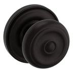 Baldwin Hardware Perilla 5020 Colonial con Roseta 5048 — Bronce aceitado — Paso