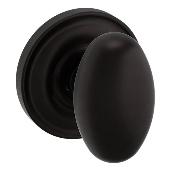 Baldwin Hardware Perilla 5025 con Roseta 5048 — Bronce aceitado — Dummy completo