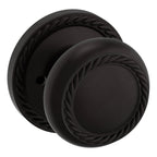Baldwin Hardware Perilla 5064 con Roseta 5004 — Bronce aceitado — Privacidad