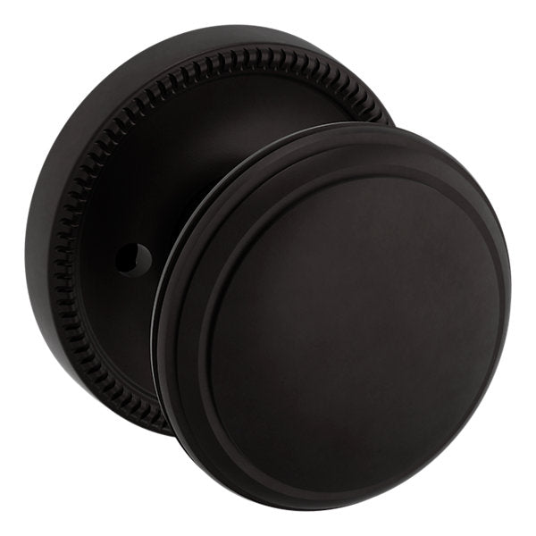 Baldwin Hardware Perilla 5069 con Roseta 5076 — Bronce aceitado — Privacidad