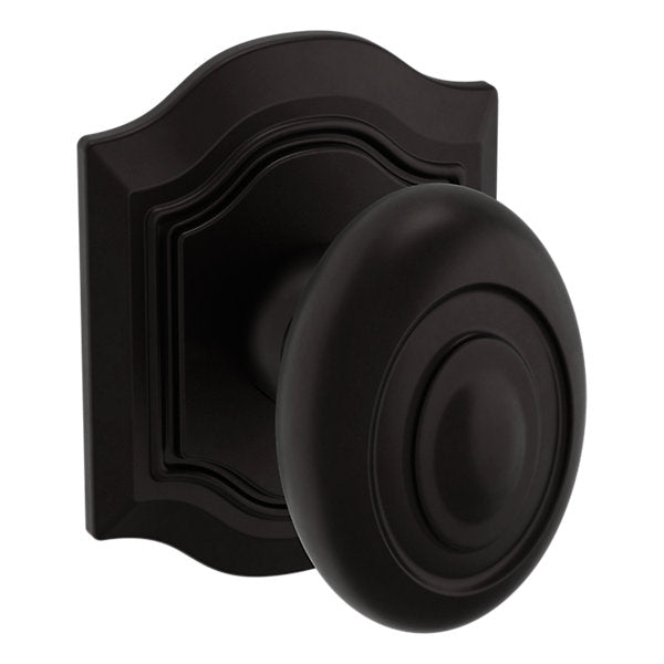 Baldwin Hardware Perilla 5077 Bethpage con Roseta R027 — Bronce aceitado — Paso