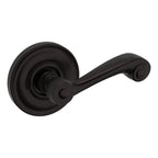 Baldwin Hardware Manija 5103 con Roseta 5048 — Bronce aceitado — Paso