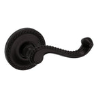 Baldwin Hardware Manija 5104 con Roseta 5004 — Bronce aceitado — Paso