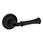 Baldwin Hardware Manija 5118 con Roseta 5076 — Bronce aceitado — Paso