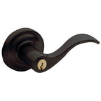 Baldwin Hardware Juego de Entrada con Llave 5255 — Manija Wave con Roseta Clásica — Bronce aceitado
