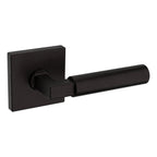 Baldwin Hardware Manija L029 Gramercy con Roseta R017 — Bronce aceitado — Paso