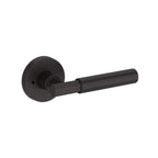 Baldwin Hardware Manija Reserve Riddling — Bronce veneciano — Contemporary Round — Privacidad