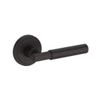 Baldwin Hardware Manija Reserve Riddling — Bronce veneciano — Stepped Round — Dummy completo