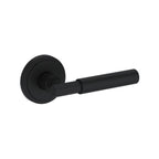 Baldwin Hardware Manija Reserve Riddling — Negro satinado — Stepped Round — Paso
