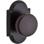 Baldwin Hardware Reserve Perilla Rustic — Bronce oscuro — Rustic Arch — Paso