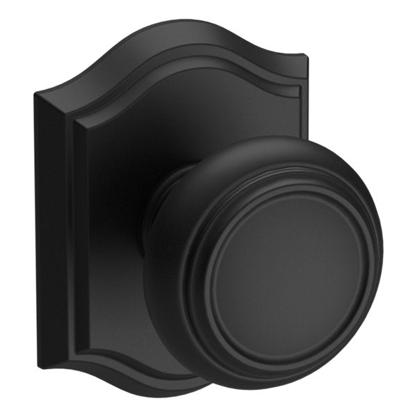 Baldwin Hardware Reserve Perilla Traditional — Negro satinado — Traditional Arch — Paso
