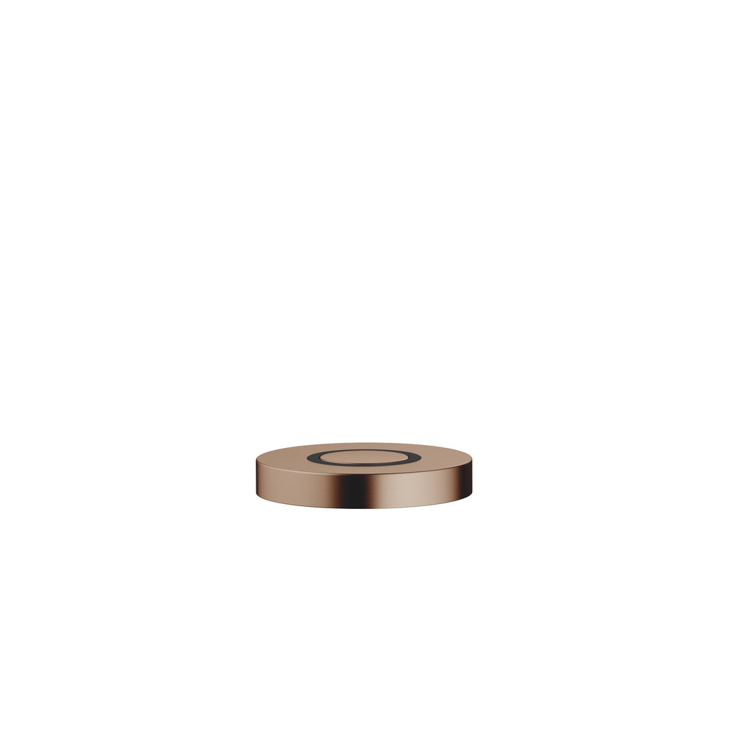 Botón neumático AIR SWITCH de Dornbracht, de perfil plano y circular, para accionar el triturador de desperdicios, acabado Bronce cepillado (PVD)