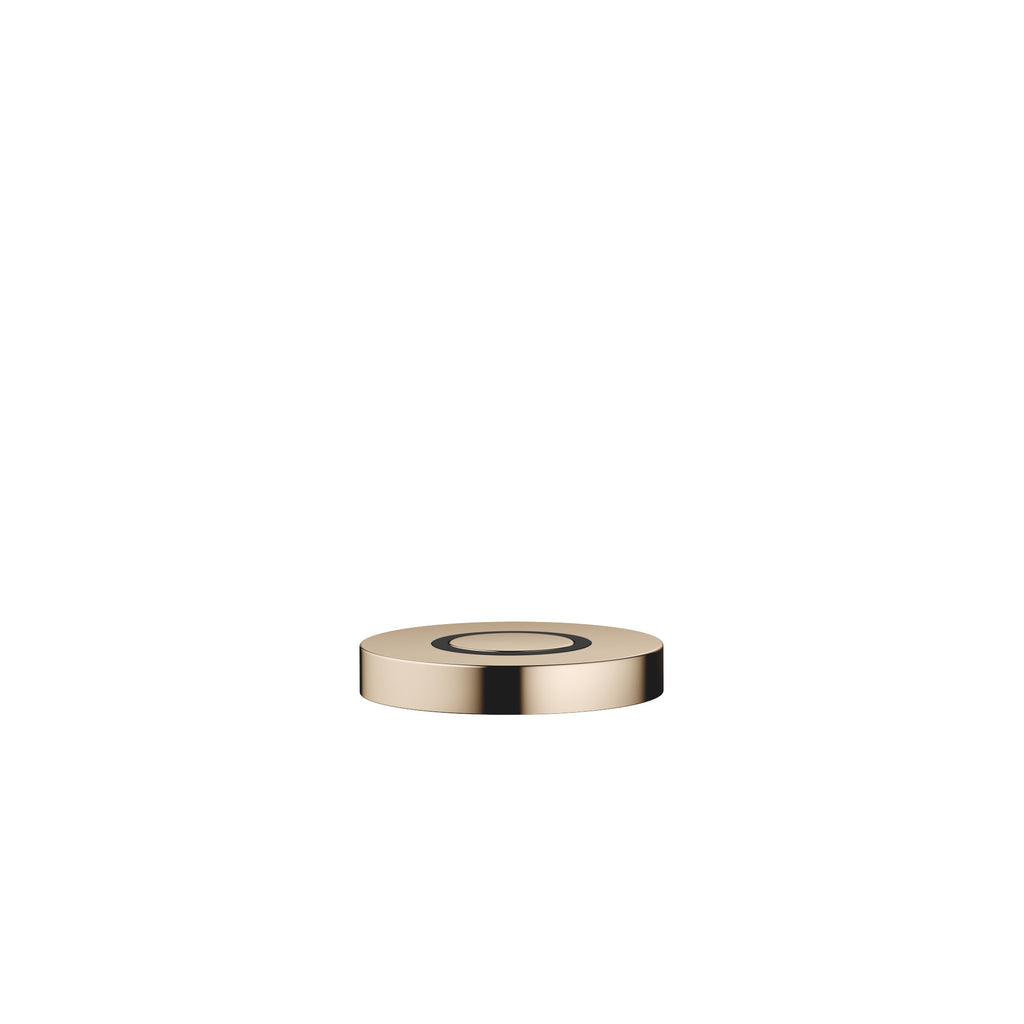 Botón neumático AIR SWITCH de Dornbracht, de perfil plano y circular, para accionar el triturador de desperdicios, acabado Champagne (Oro 22k)