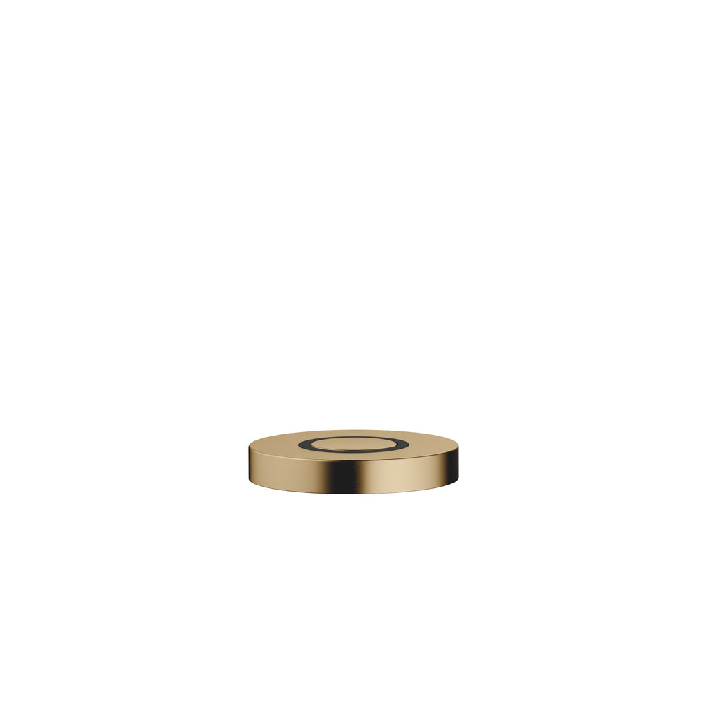 Botón neumático AIR SWITCH de Dornbracht, de perfil plano y circular, para accionar el triturador de desperdicios, acabado Dark Brass cepillado (PVD)