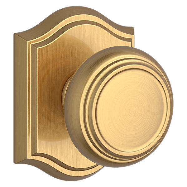 Baldwin Hardware Reserve Perilla Traditional — Latón satinado Lifetime — Traditional Arch — Paso