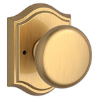 Baldwin Hardware Reserve Perilla Round — Latón satinado Lifetime — Traditional Arch — Privacidad