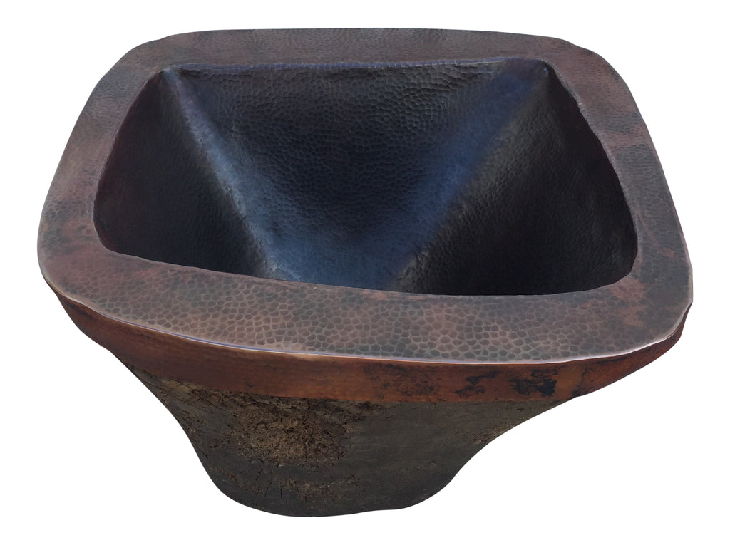 Lavabo de cobre sobre madera
