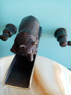 Bronze bear waterfall faucet 