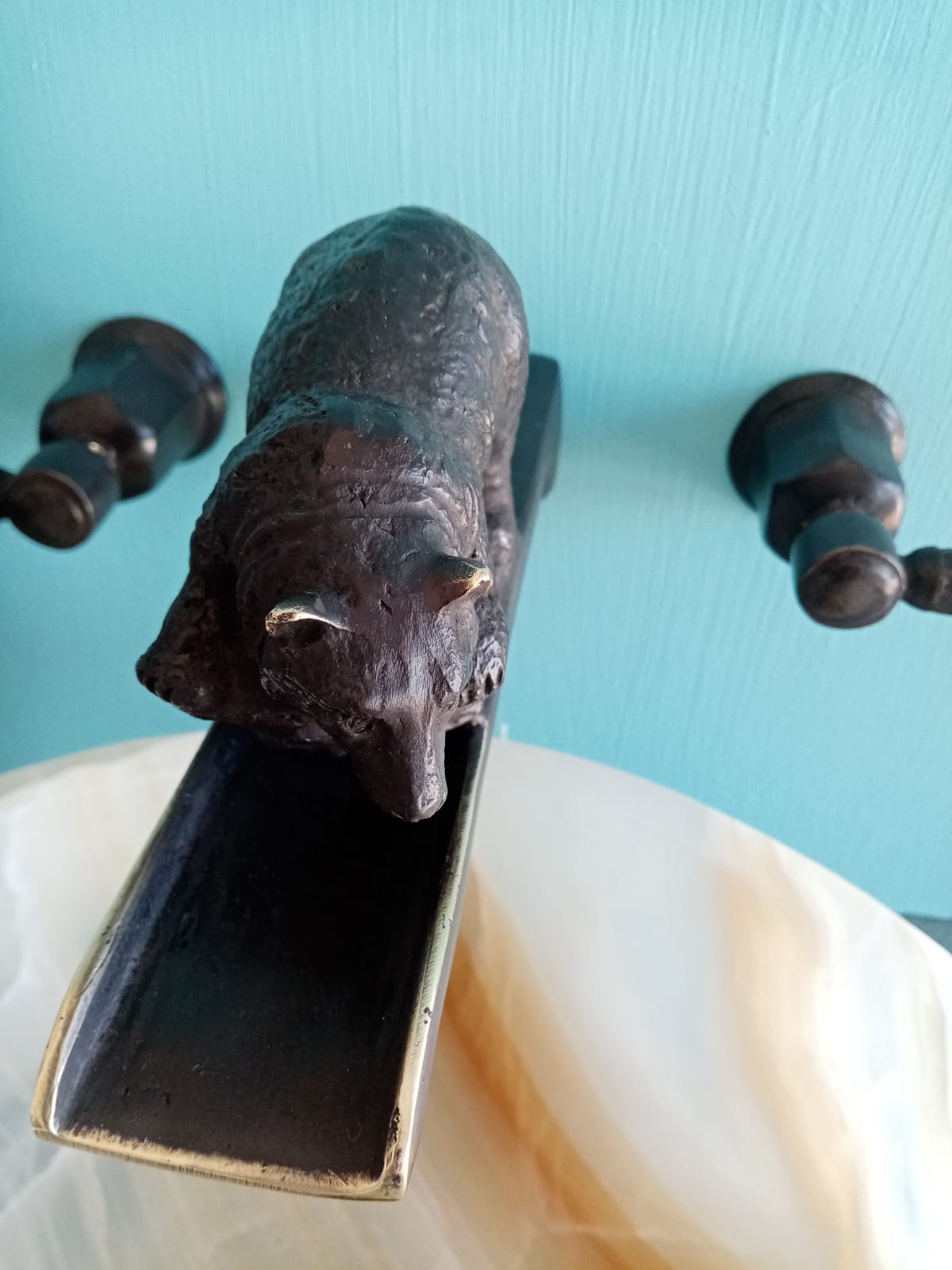 Bronze bear waterfall faucet 
