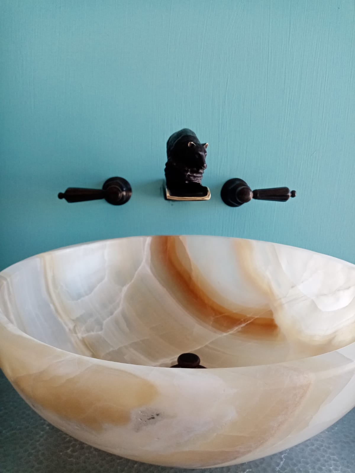 Bronze bear waterfall faucet 