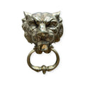 toca la puerta laton lion